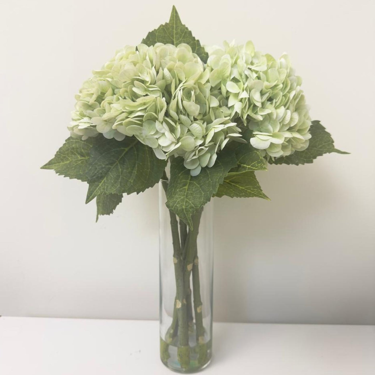 ARTIFICIAL HYDRANGEA IN SLIM GLASS VASE