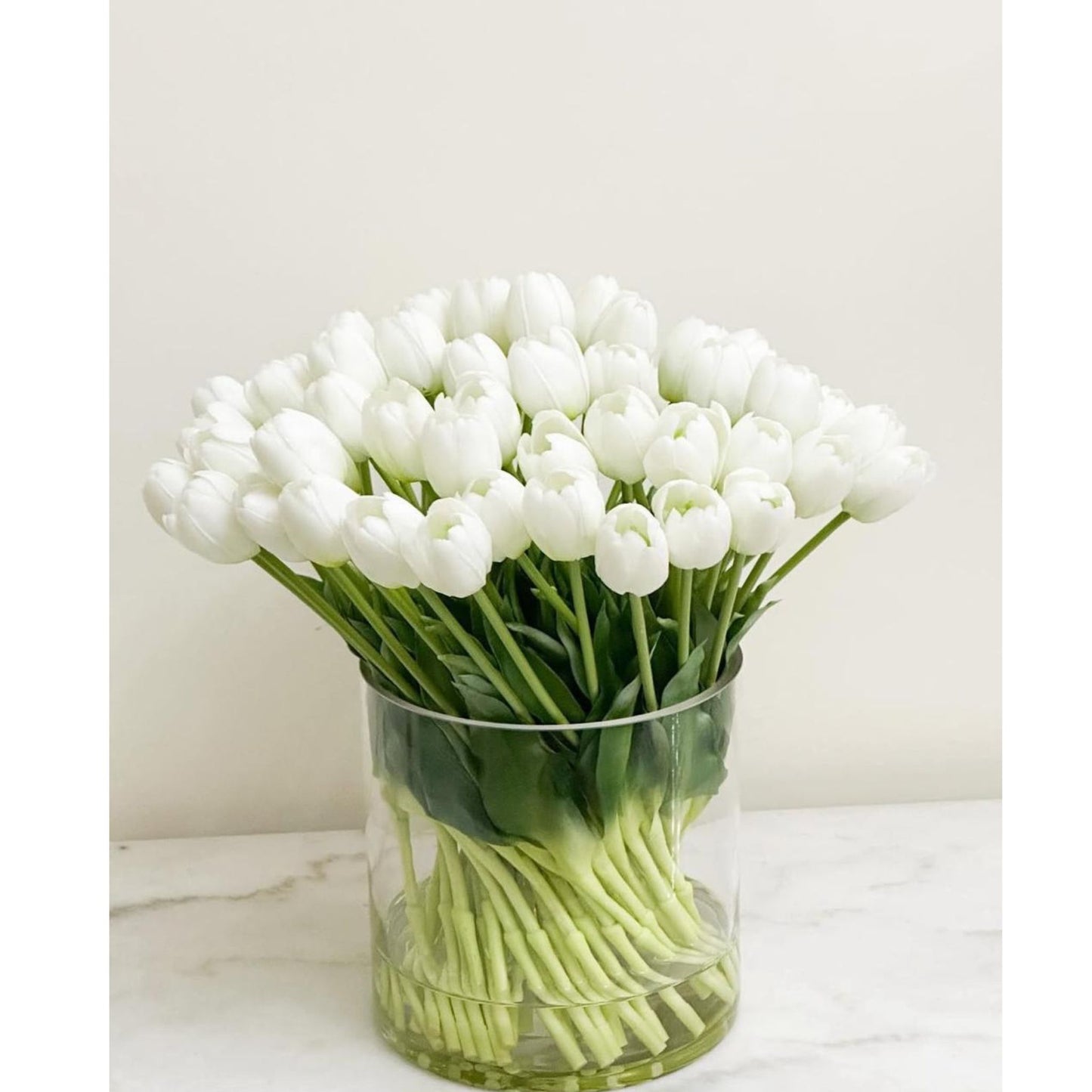 ARTIFICIAL WHITE TULIPS IN GLASS VASE