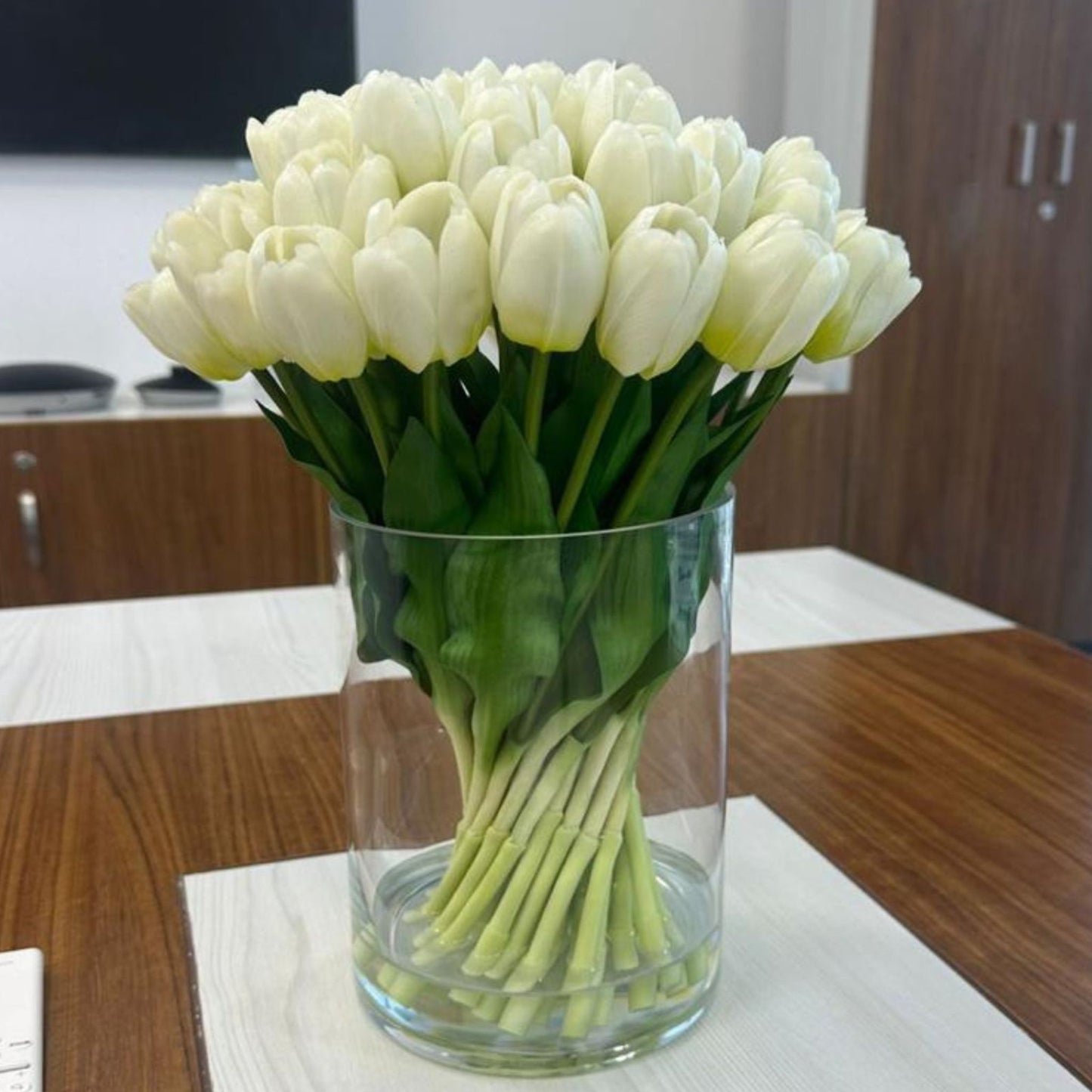 ARTIFICIAL WHITE TULIPS IN GLASS VASE