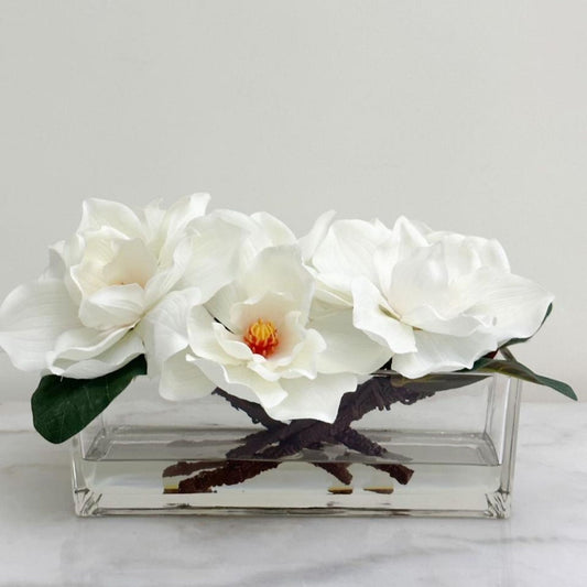 ARTIFICIAL MAGNOLIA IN RECTANGULAR GLASS VASE