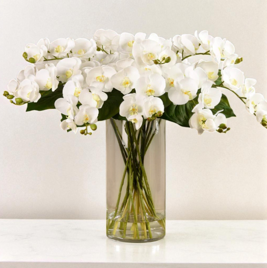 ARTIFICIAL ORCHID ARRANGEMENT IN GLASS VASE